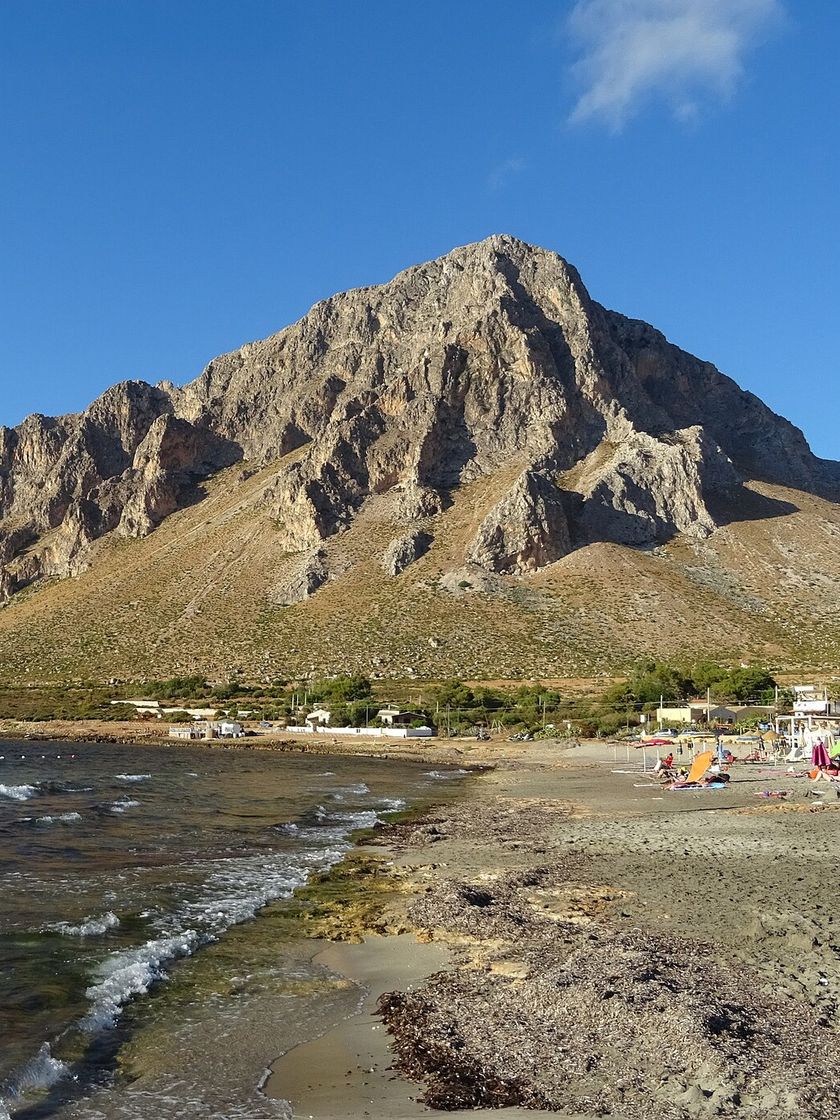 The beach in the bay of Cornino, with Monte Cofano dropping into the sea