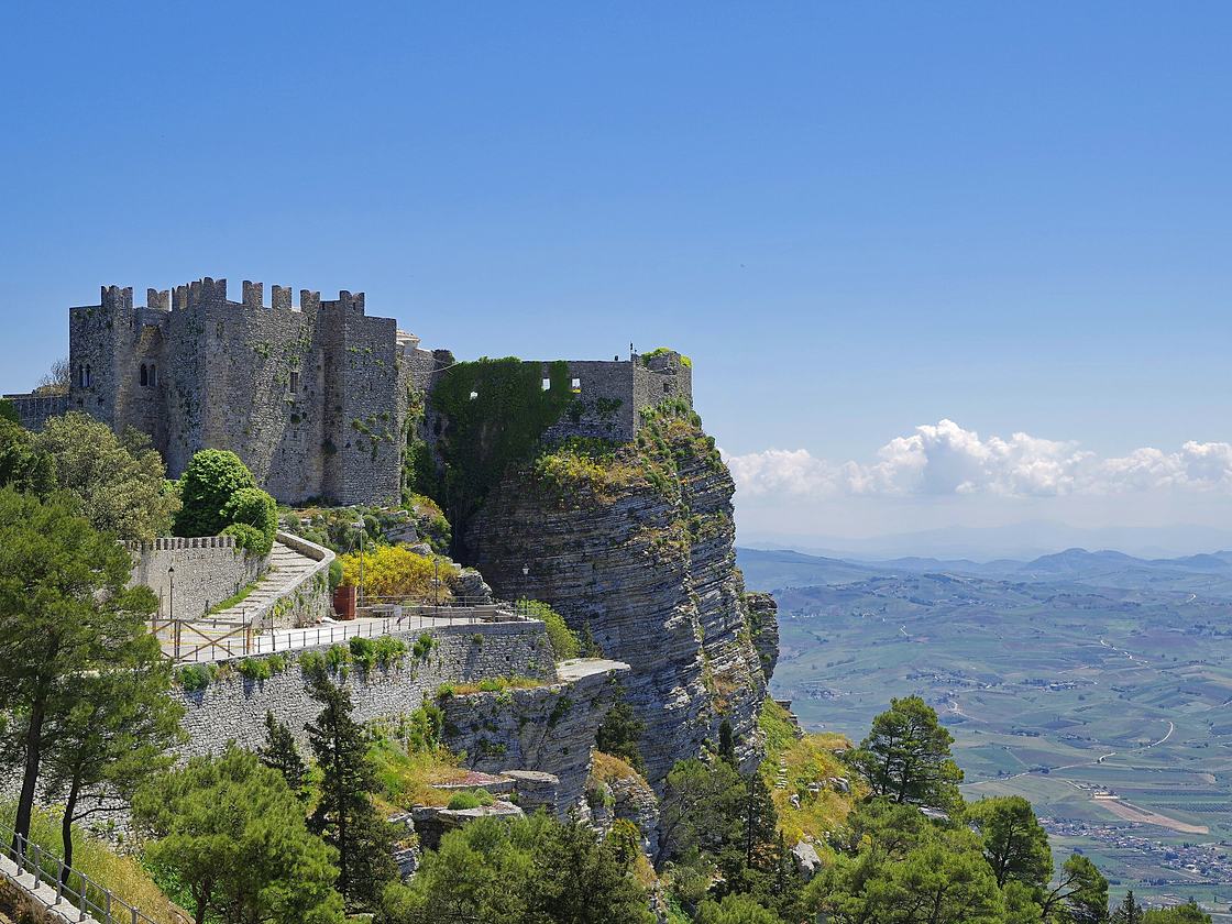 The Castle of Venus at Erice on the edge of the cliff, with the plain of Trapani below