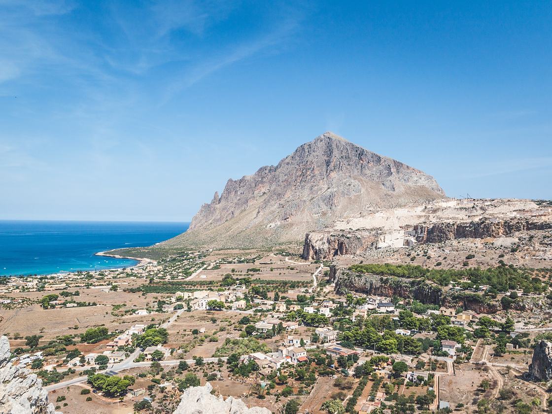 Monte Cofano seen from above, with the bay of Cornino and the countryside at its foot