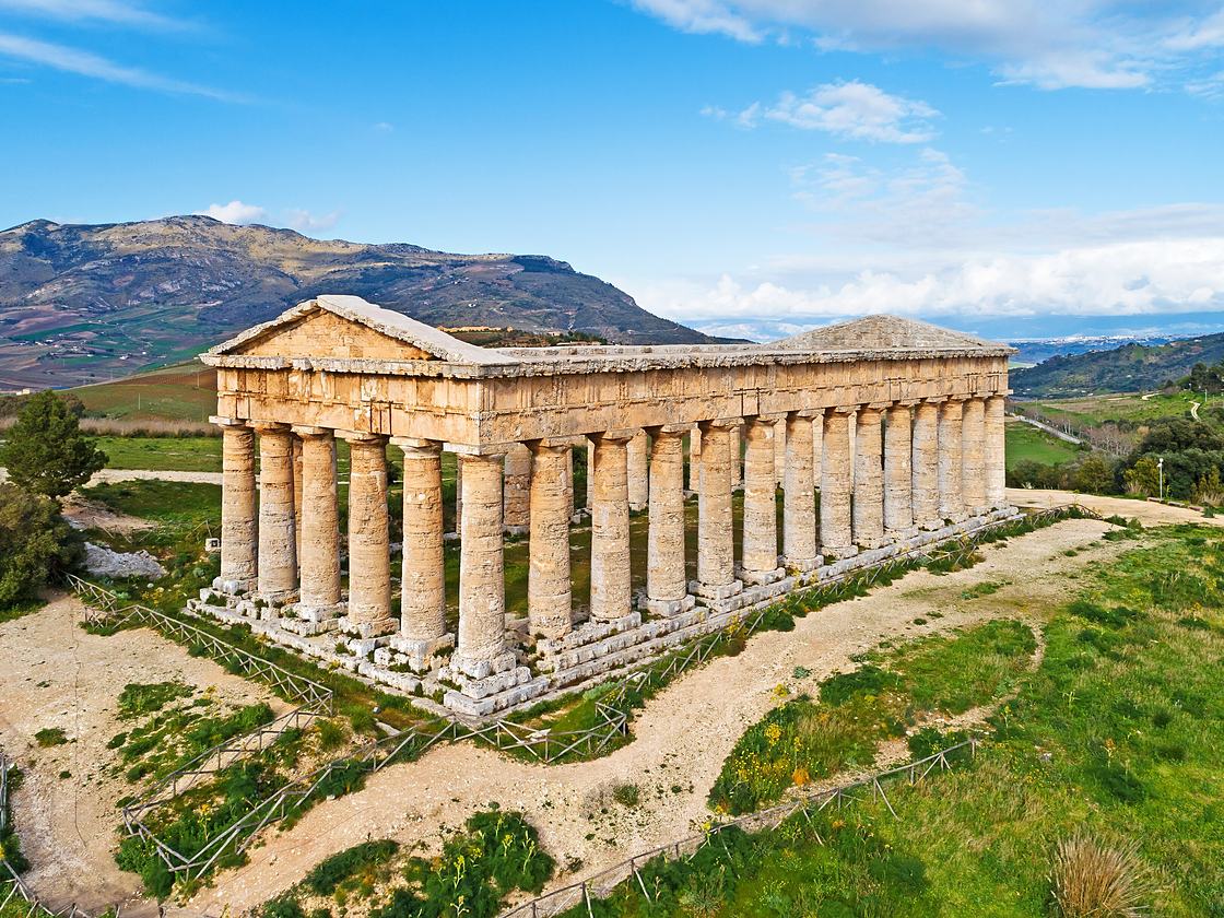 The Doric temple of Segesta on its hill, with the valley and the mountains behind